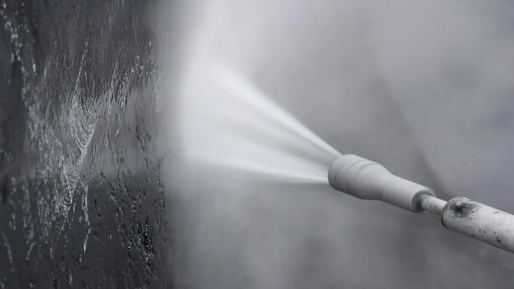 Metal surface preparation with pressurized water jet