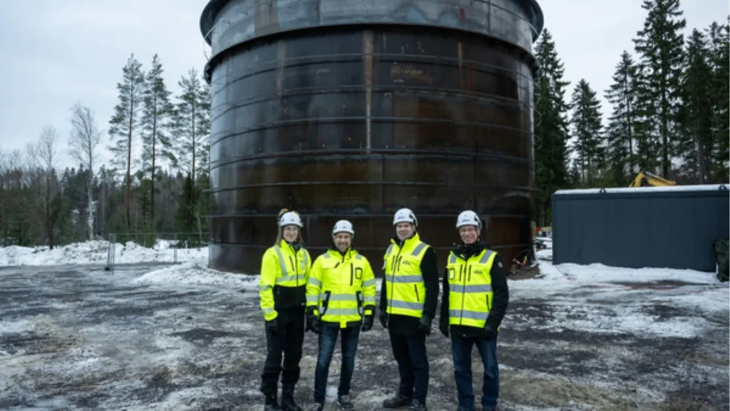 Elisa's team next to the sand battery