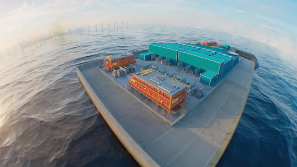 Vista de la infraestructura técnica sobre la Isla Princesa Isabel en el Mar del Norte, rodeada por turbinas eólicas marinas.