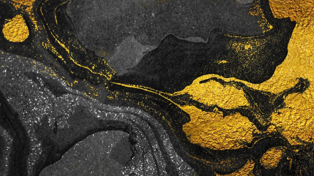 Textura abstracta en negro y dorado que evoca transmutación atómica y energía de fusión nuclear.