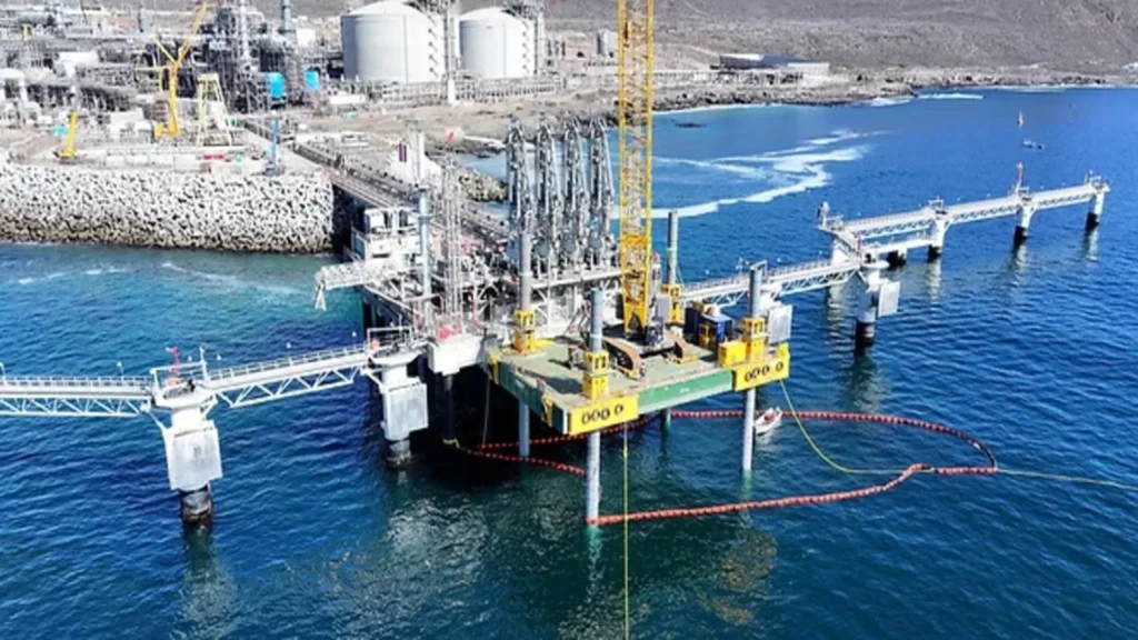 Grupo HB offshore marine engineering project in operation with crane and jack-up platform.